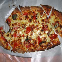 I nostre pizze, per favore.